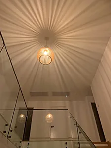 A feature pendant light in a high ceiling void