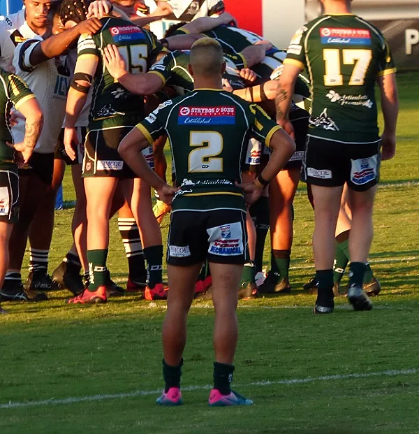 Ipswich Jets rugby league players in a huddle before a game