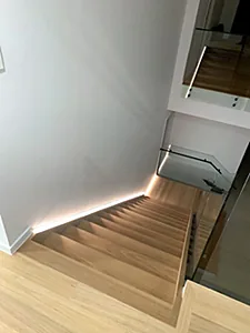 LED strip lighting under a timber staircase