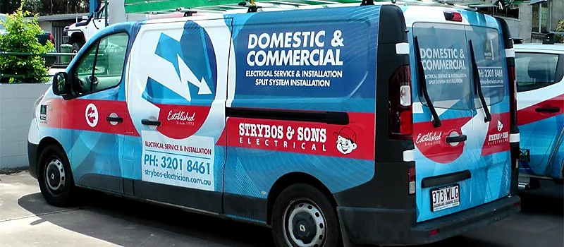 Strybos & Sons service van parked in a driveway